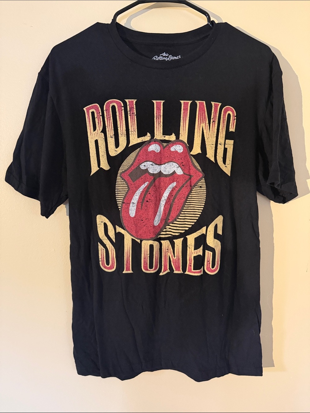 the Rolling Stones Black Tee with Red Tongue and Yellow Lettering
